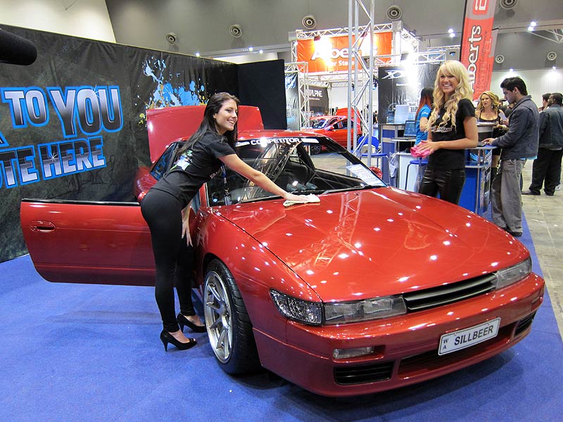 Just Car Insurance promo girls with SILLBEER at Perth Autosalon