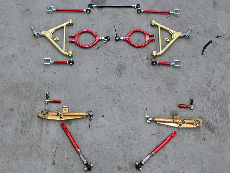 Adjustable suspension arms front and rear